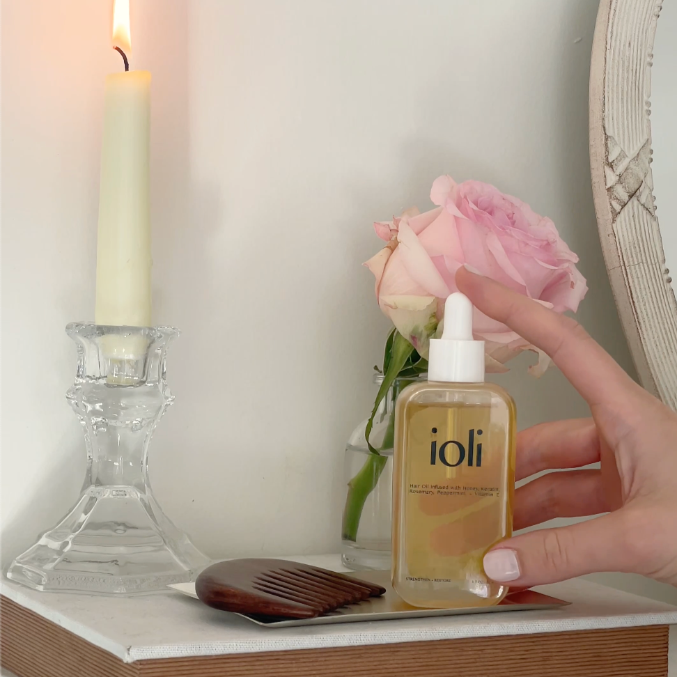how to oil your hair using a dropper hair oil